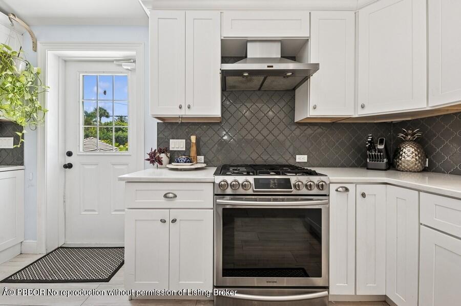 310 Almeria Road West Palm Beach, FL 33405 - Photo 16 of 71 16_310AlmeriaRd_177005_Kitchen_Small