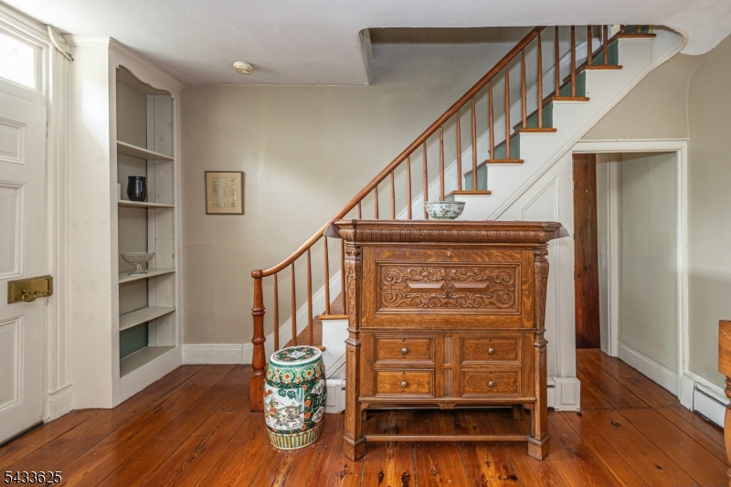 449 Stamets Road Milford, NJ 08848 - Photo 24 of 44 a view of entryway and hall with wooden floor