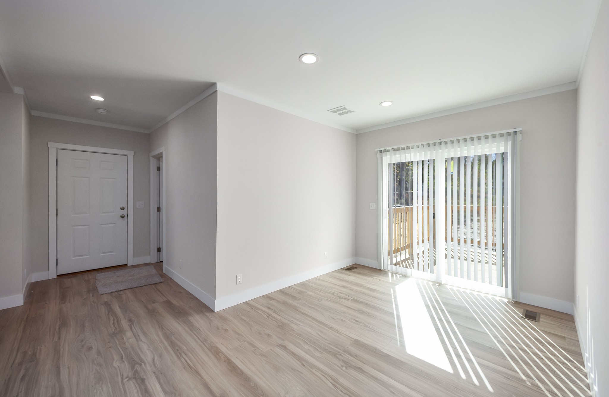 2127 North Royal Street Jackson, TN 38305 - Photo 9 of 24 a view of a livingroom with wooden floor