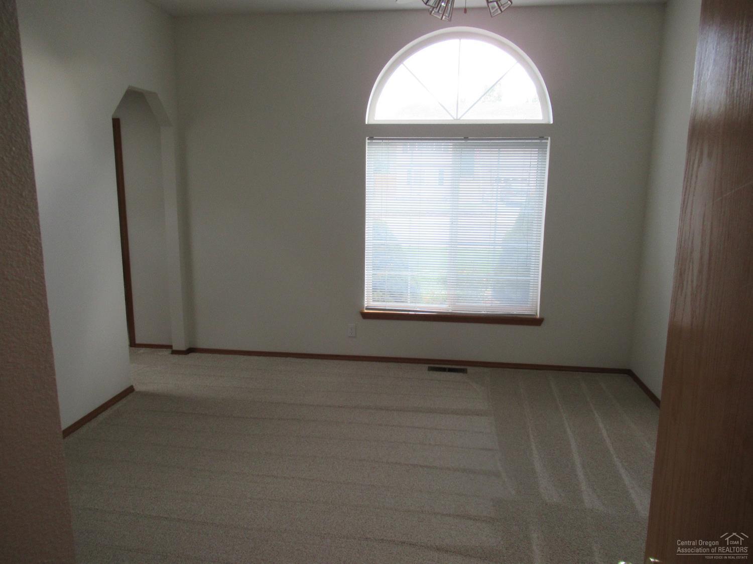 3048 Northeast Raleigh Court Bend, OR 97701 - Photo 8 of 22 Separate master bedroom has large window