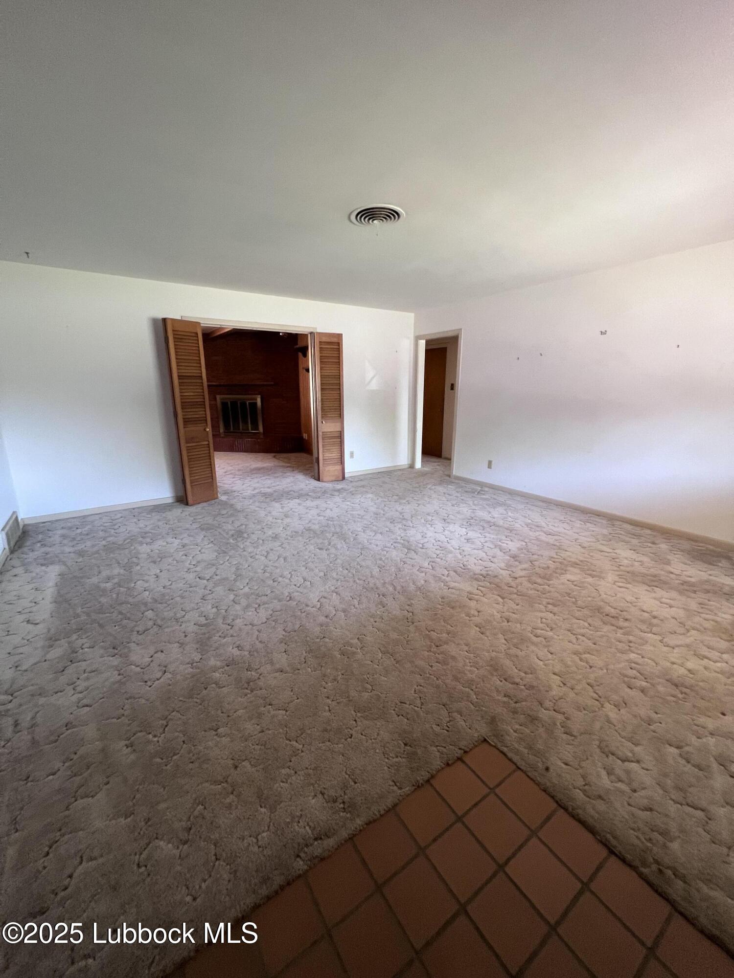 2304 54th Street Lubbock, TX 79412 - Photo 7 of 18 a view of an empty room