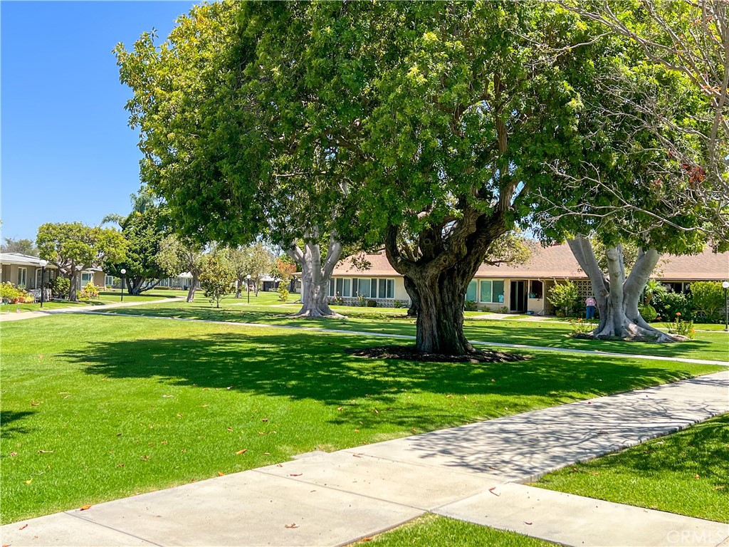 1561 Interlachen Road Seal Beach, CA 90740 - Photo 3 of 3 a front view of a house with a yard