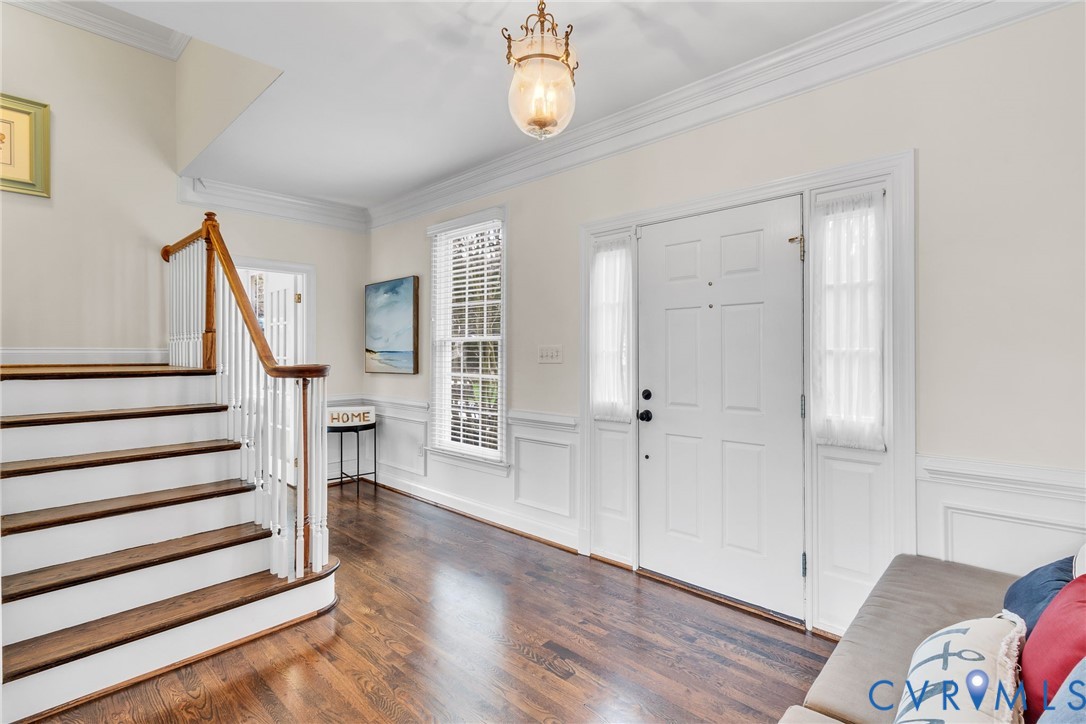 5337 Irvington Road White Stone, VA 22578 - Photo 17 of 53 Large foyer with ornamental molding and dark wood