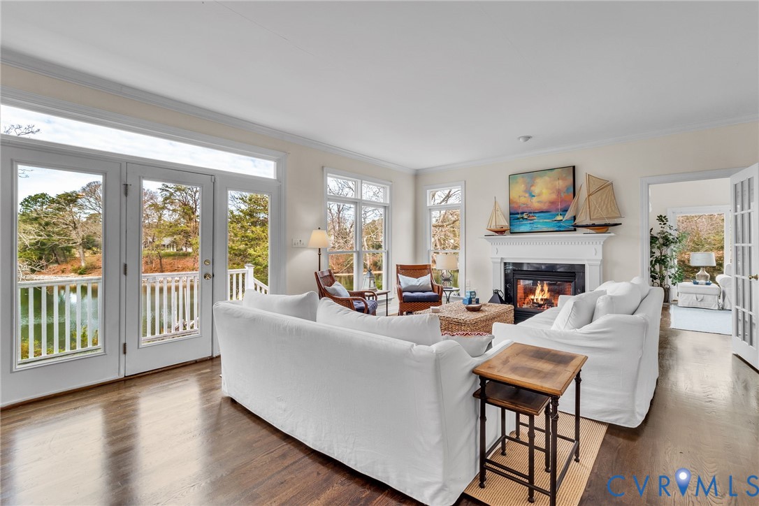 5337 Irvington Road White Stone, VA 22578 - Photo 19 of 53 Living room with water view and gas fireplace
