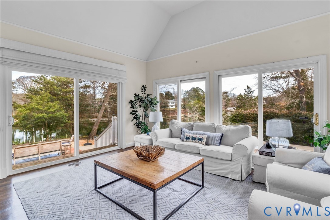 5337 Irvington Road White Stone, VA 22578 - Photo 22 of 53 Sunroom with vaulted ceiling and water view