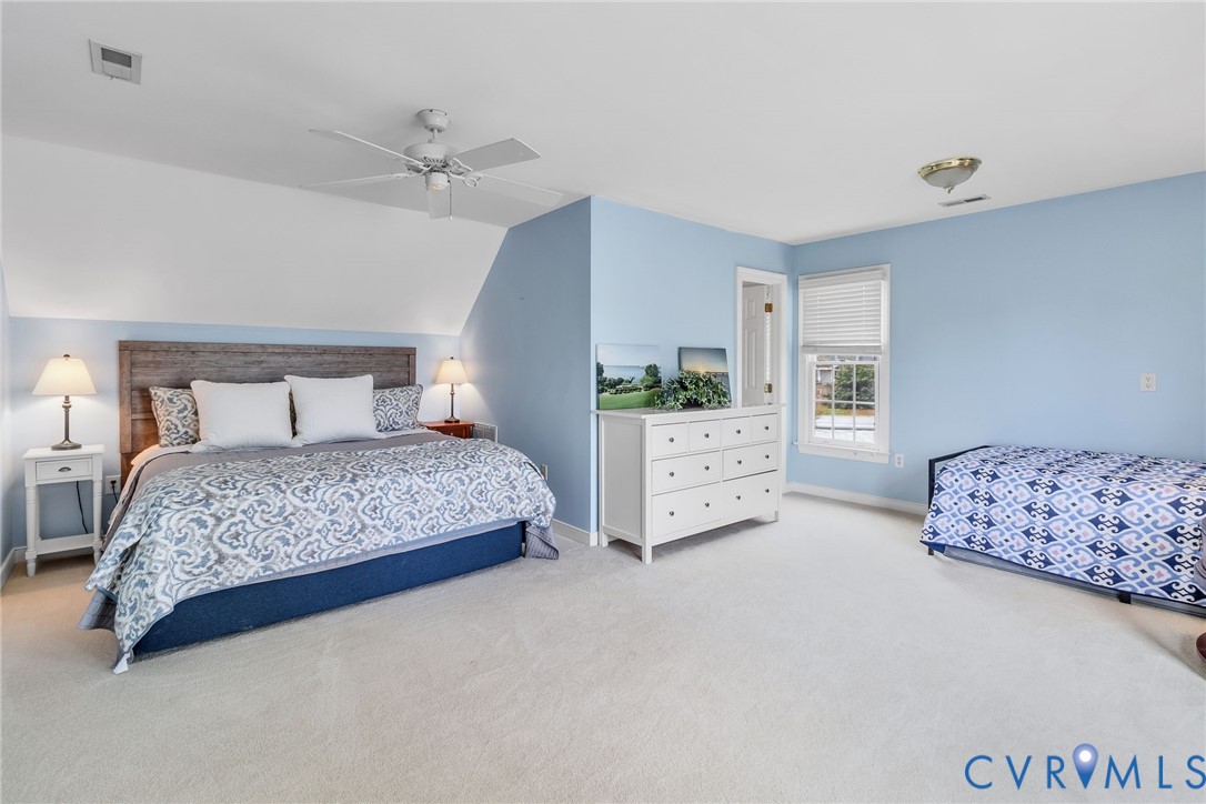 5337 Irvington Road White Stone, VA 22578 - Photo 31 of 53 Bedroom featuring light colored carpet, ceiling fa