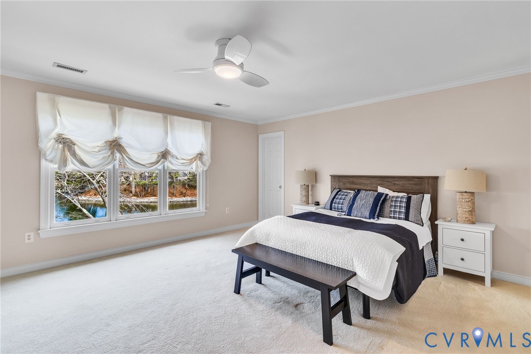 5337 Irvington Road White Stone, VA 22578 - Photo 36 of 53 Bedroom featuring light carpet, ceiling fan, and e