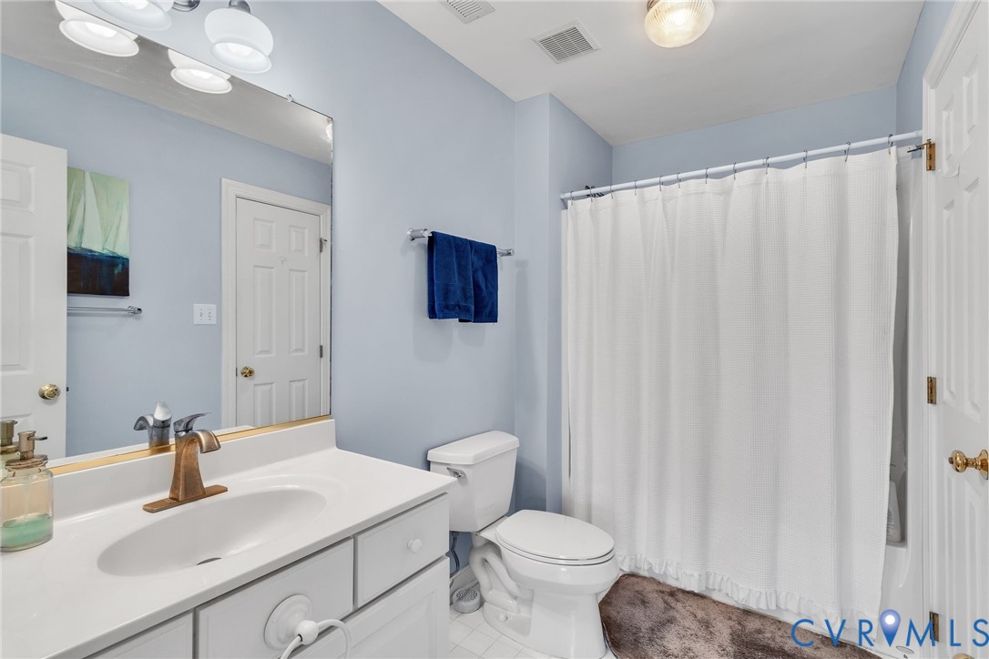 5337 Irvington Road White Stone, VA 22578 - Photo 40 of 53 Bathroom featuring vanity and light tile patterned