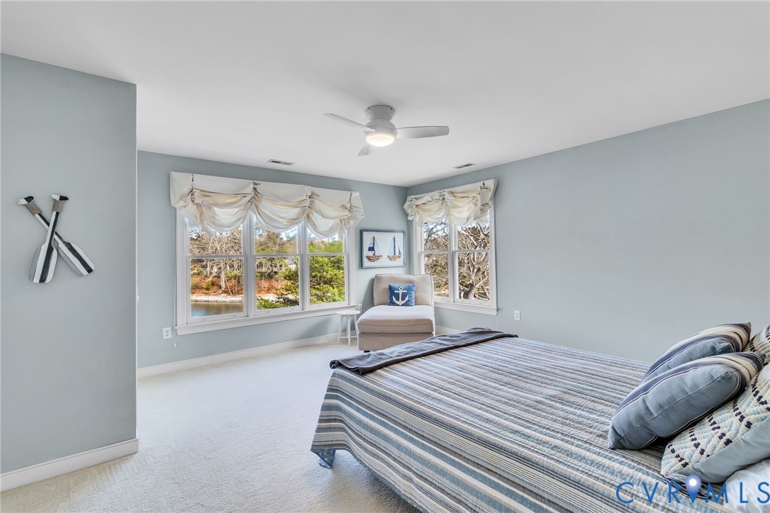 5337 Irvington Road White Stone, VA 22578 - Photo 41 of 53 Carpeted bedroom with a water view