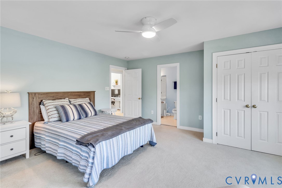 5337 Irvington Road White Stone, VA 22578 - Photo 42 of 53 Bedroom with light colored carpet, ceiling fan, a