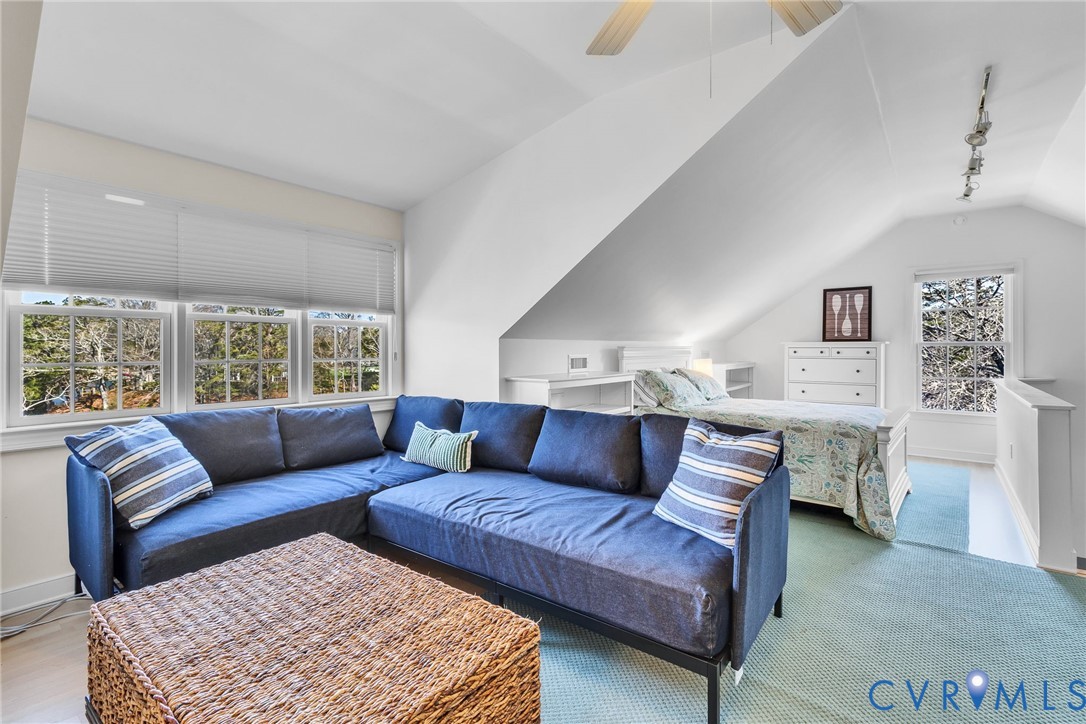 5337 Irvington Road White Stone, VA 22578 - Photo 46 of 53 Living area with track lighting, vaulted ceiling,