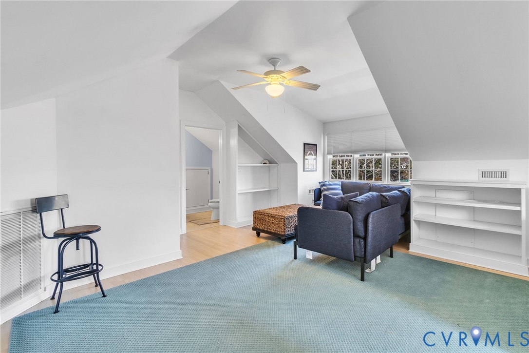 5337 Irvington Road White Stone, VA 22578 - Photo 48 of 53 Living area with vaulted ceiling, and ceiling fan