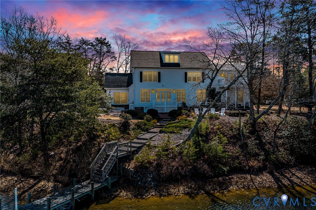 5337 Irvington Road White Stone, VA 22578 - Photo 9 of 53 Rear view of house with a water view and stairs le