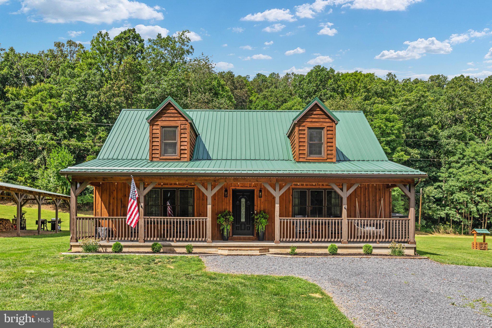 1396 Cullers Run Road Mathias, WV 26812 - Photo 1 of 79 Charming rustic home embraced by nature.