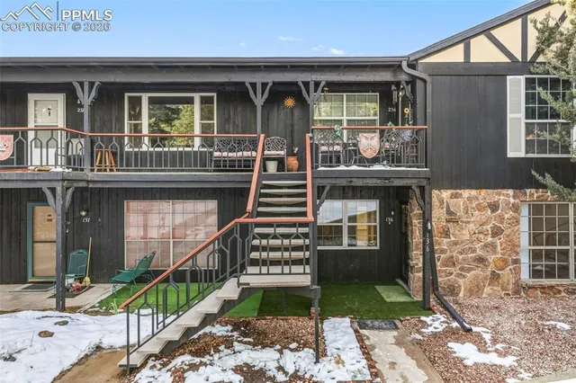 a front view of a house with a porch