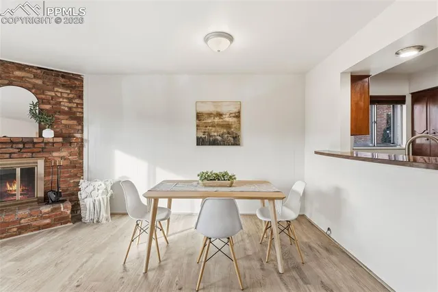 a bedroom with furniture and a fireplace