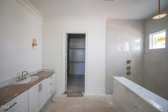 a room with walk in closet