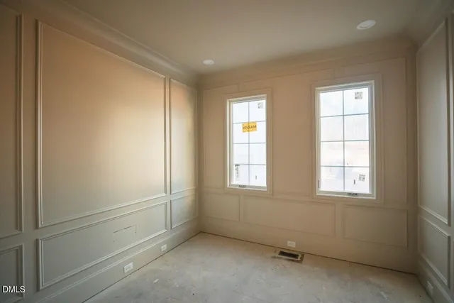 a bathroom with a toilet and a bathtub