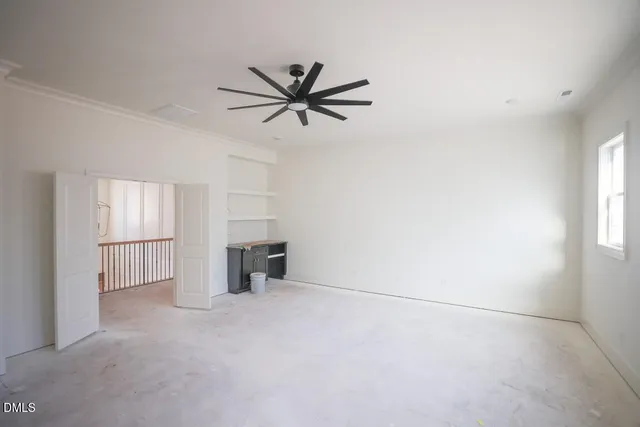 a bathroom with a granite countertop toilet a sink and a shower