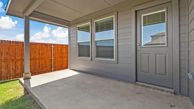 a view of storage and utility room with washer and dryer