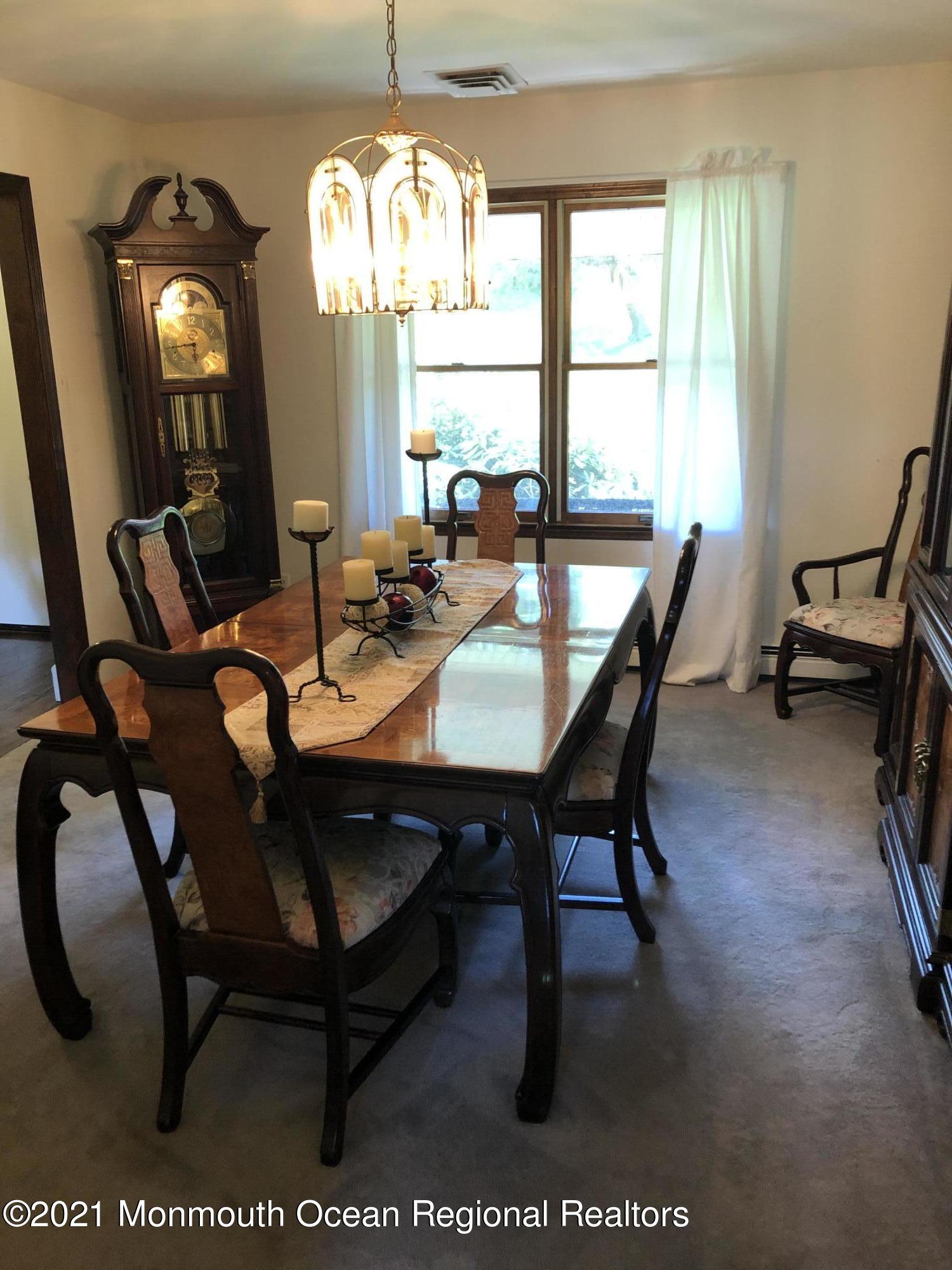 2 Hunt Road Freehold, NJ 07728 - Photo 11 of 35 a view of a dining room with furniture window and outside view