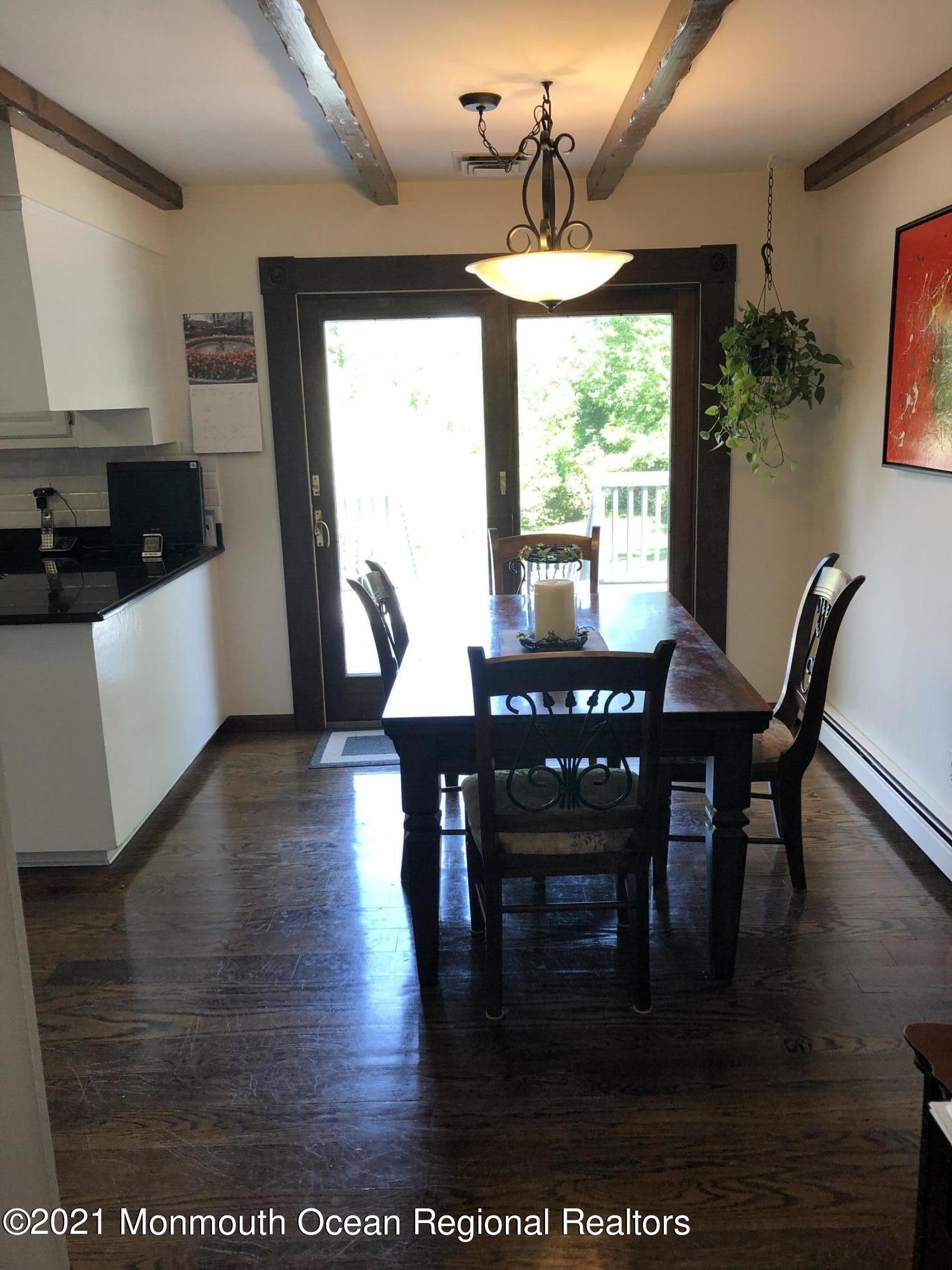 2 Hunt Road Freehold, NJ 07728 - Photo 15 of 35 a view of a dining room with furniture window and wooden floor
