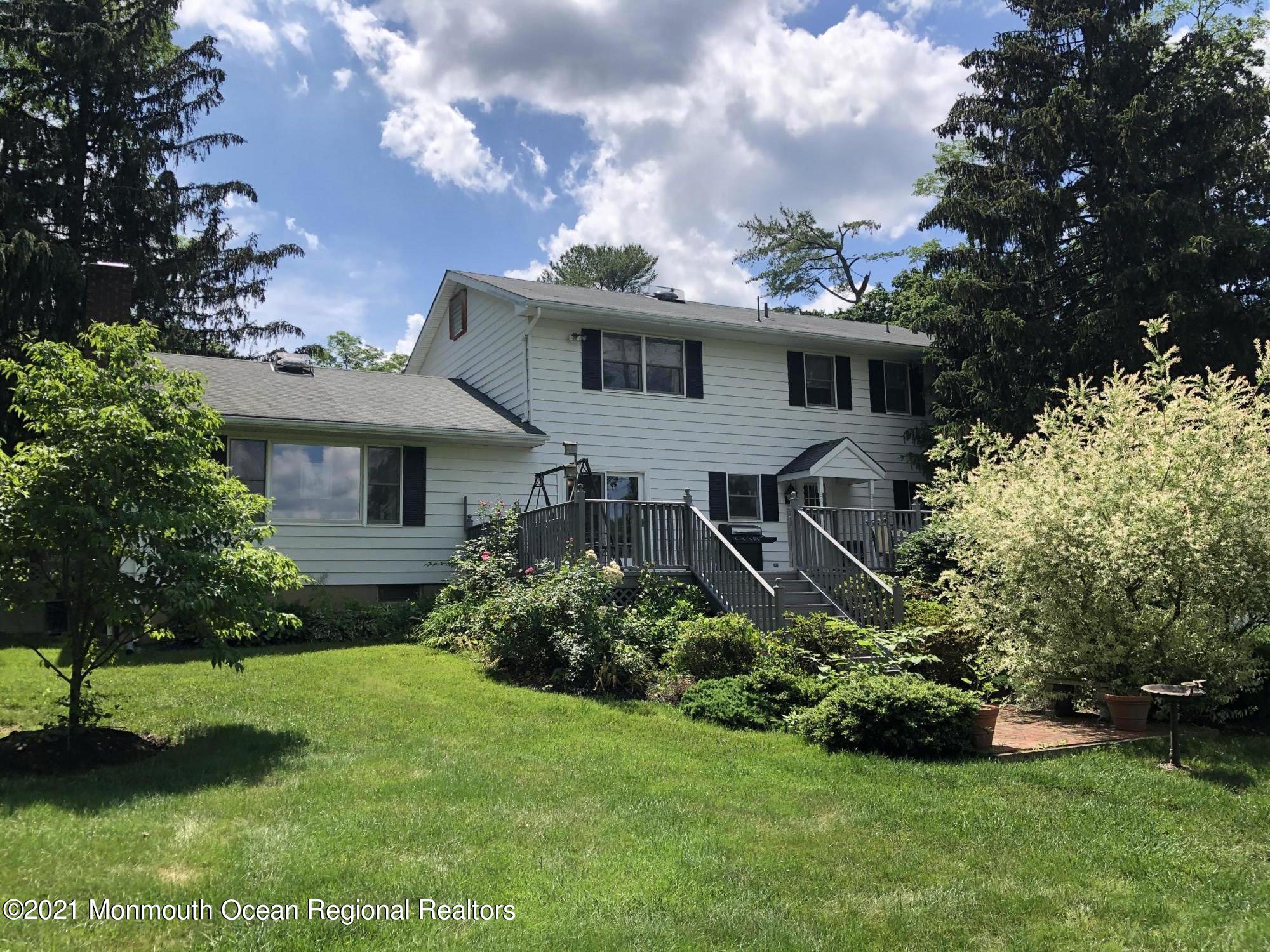 2 Hunt Road Freehold, NJ 07728 - Photo 2 of 35 a view of a house with a yard