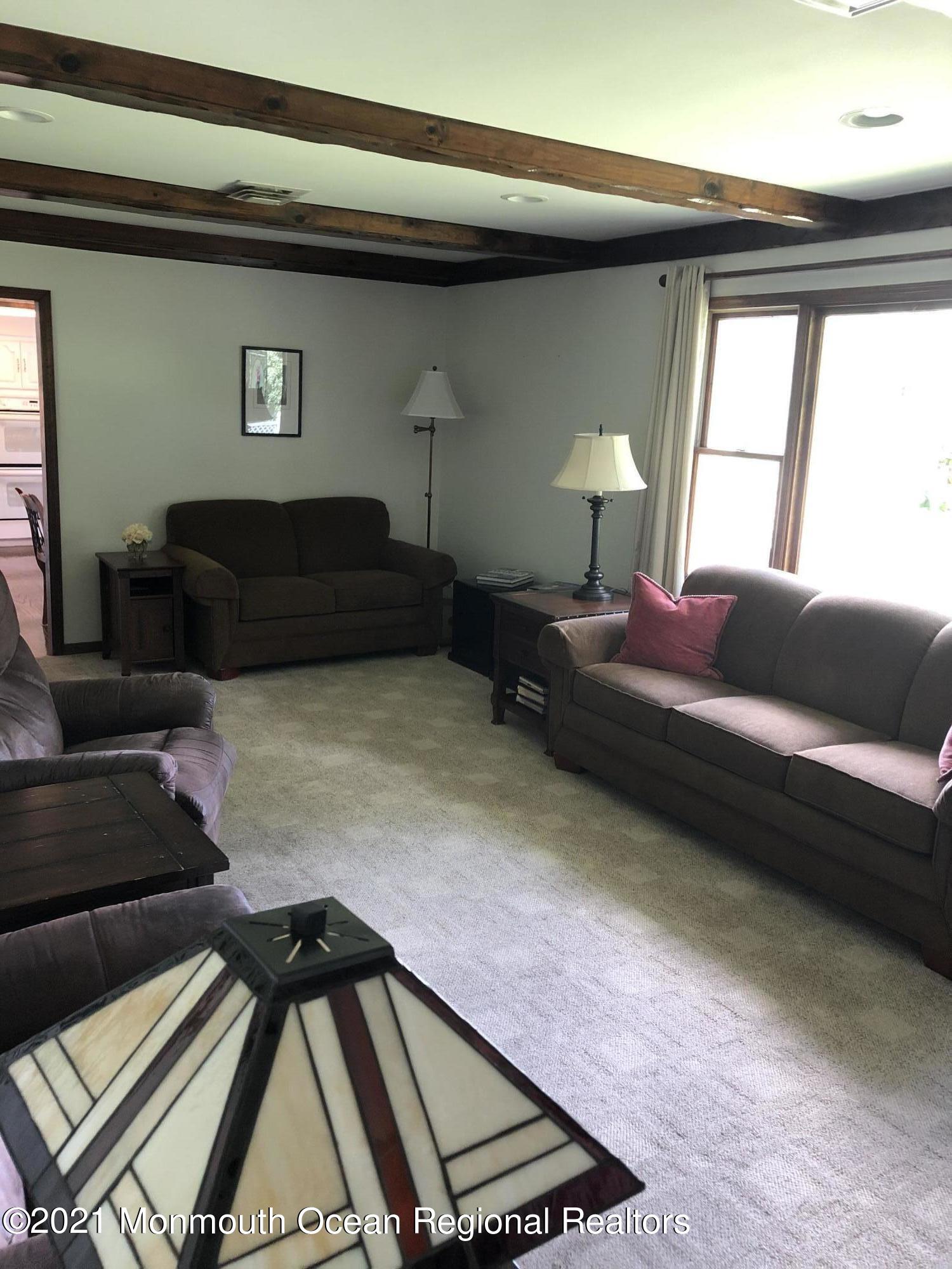 2 Hunt Road Freehold, NJ 07728 - Photo 21 of 35 a bedroom with furniture and a window