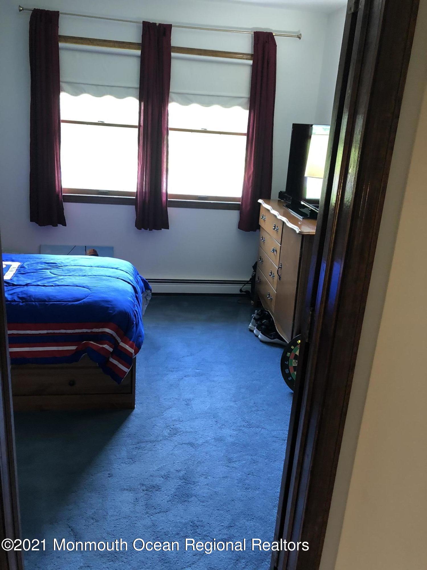 2 Hunt Road Freehold, NJ 07728 - Photo 23 of 35 a room with a bed and a window