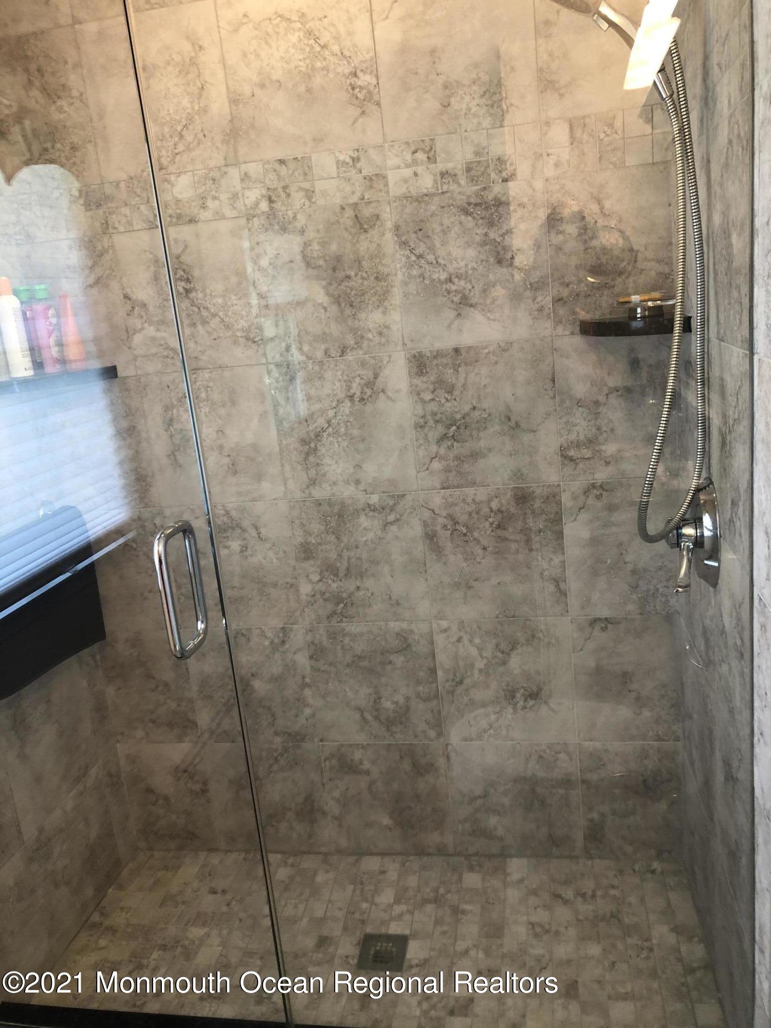 2 Hunt Road Freehold, NJ 07728 - Photo 31 of 35 a bathroom with a shower