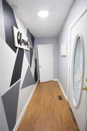 a view of front door with hallway