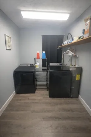 a room with cabinets and piano