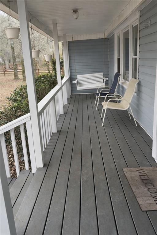 265 Winding Stream Trail Hampton, GA 30228 - Photo 2 of 29 a view of balcony with wooden floor