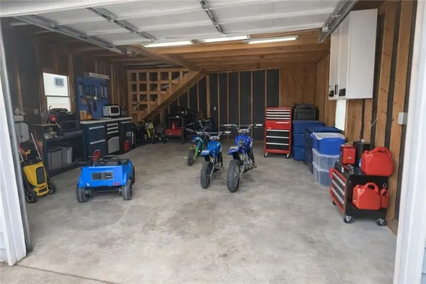 a view of play room with gym equipment