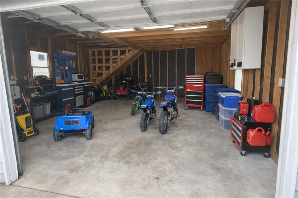 265 Winding Stream Trail Hampton, GA 30228 - Photo 25 of 29 a view of play room with gym equipment