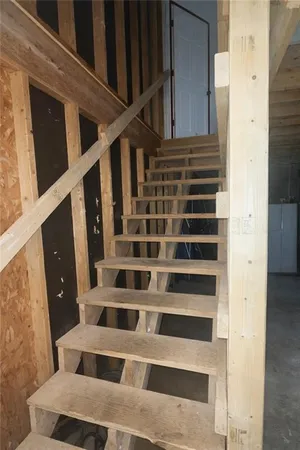 a view of entryway with a front door