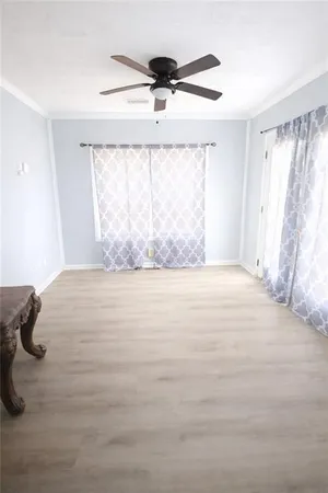 a view of large windows in a room