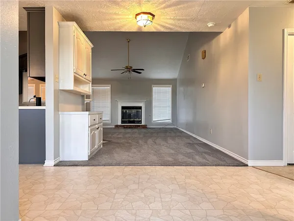 a view of livingroom with kitchen