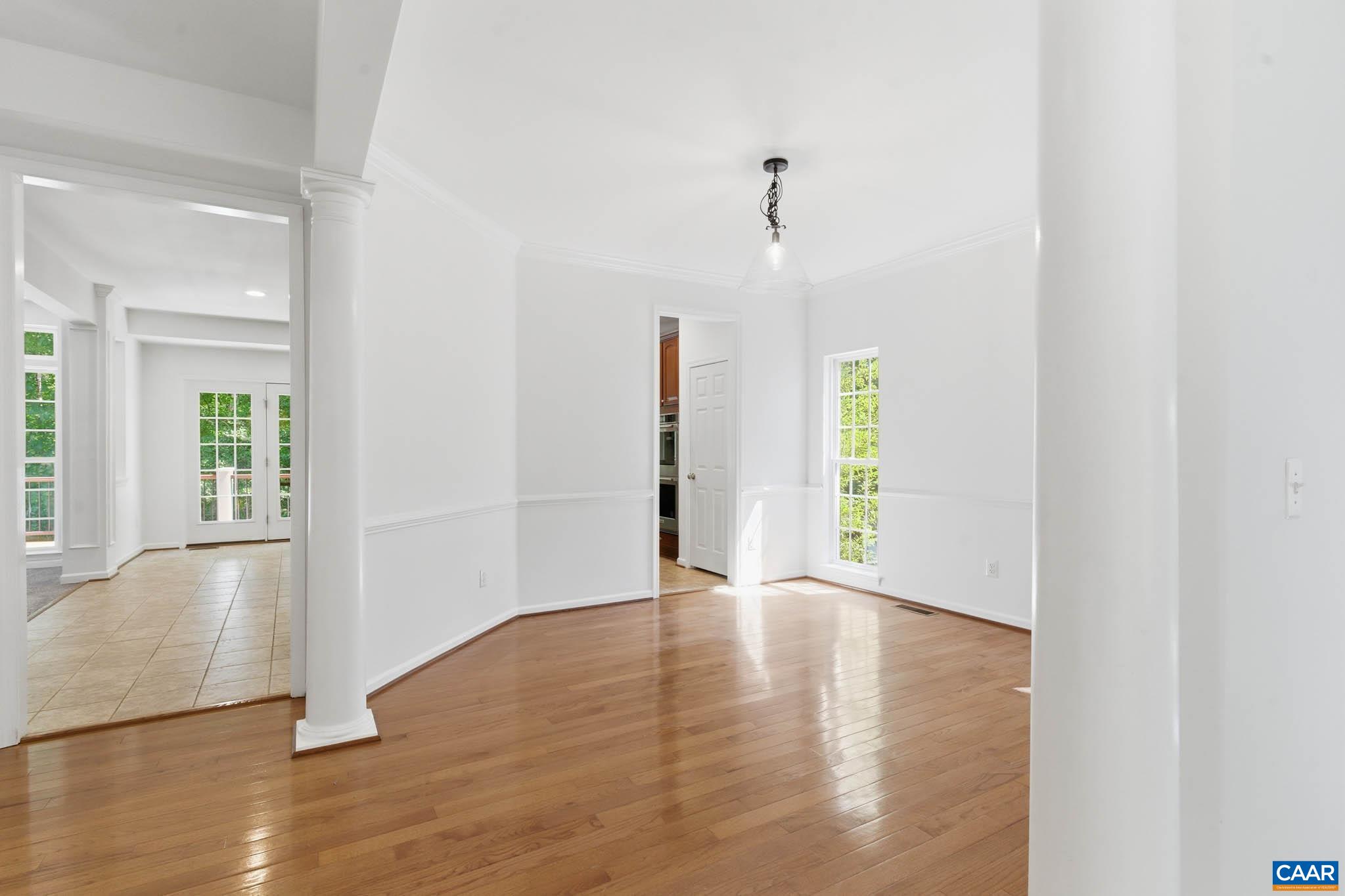 700 Rainier Road Charlottesville, VA 22903 - Photo 13 of 41 Dining room, kitchen and adjacent living areas.
