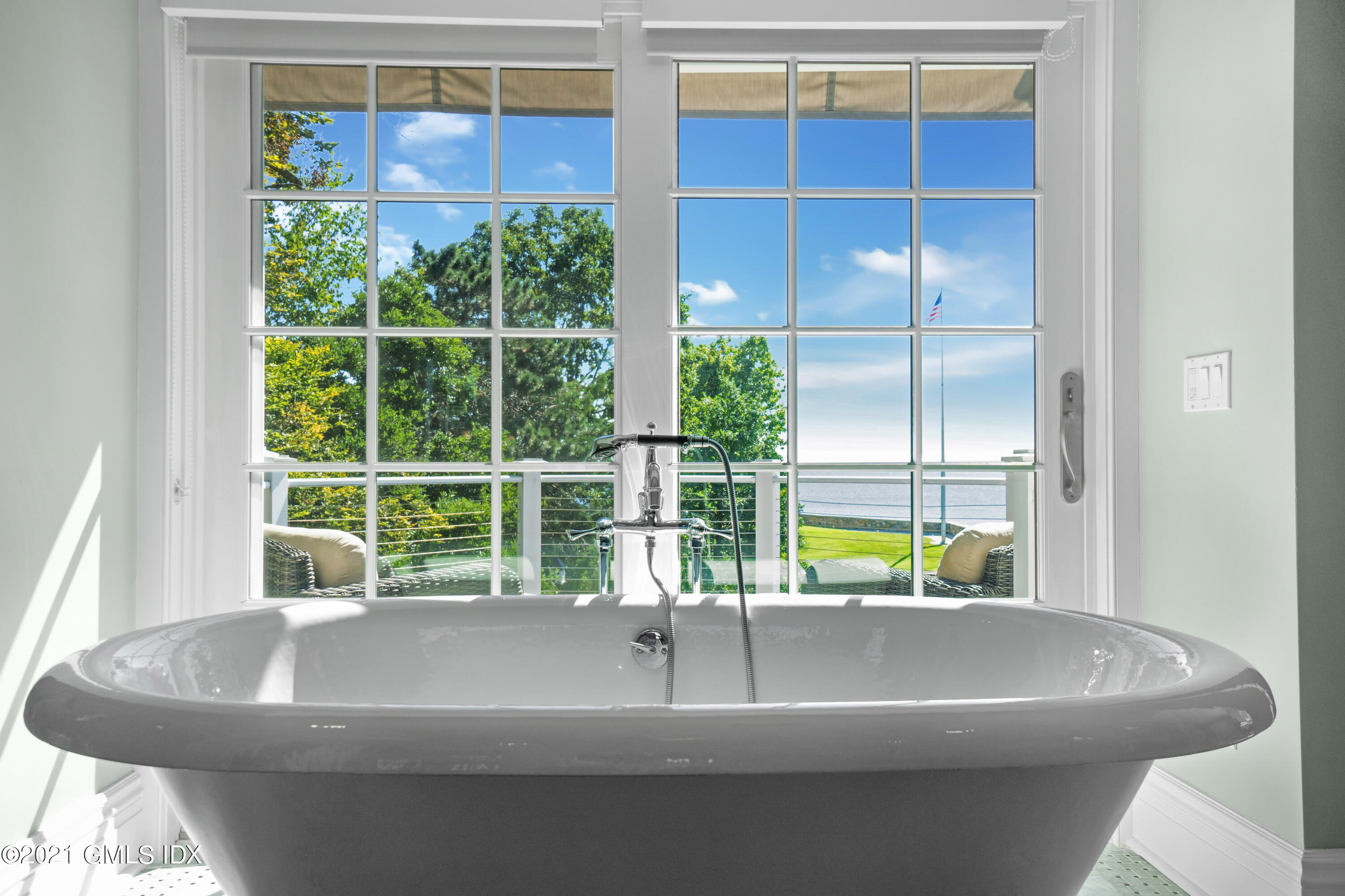 20 Ballwood Road Old Greenwich, CT 06870 - Photo 15 of 32 a bathroom with a large window