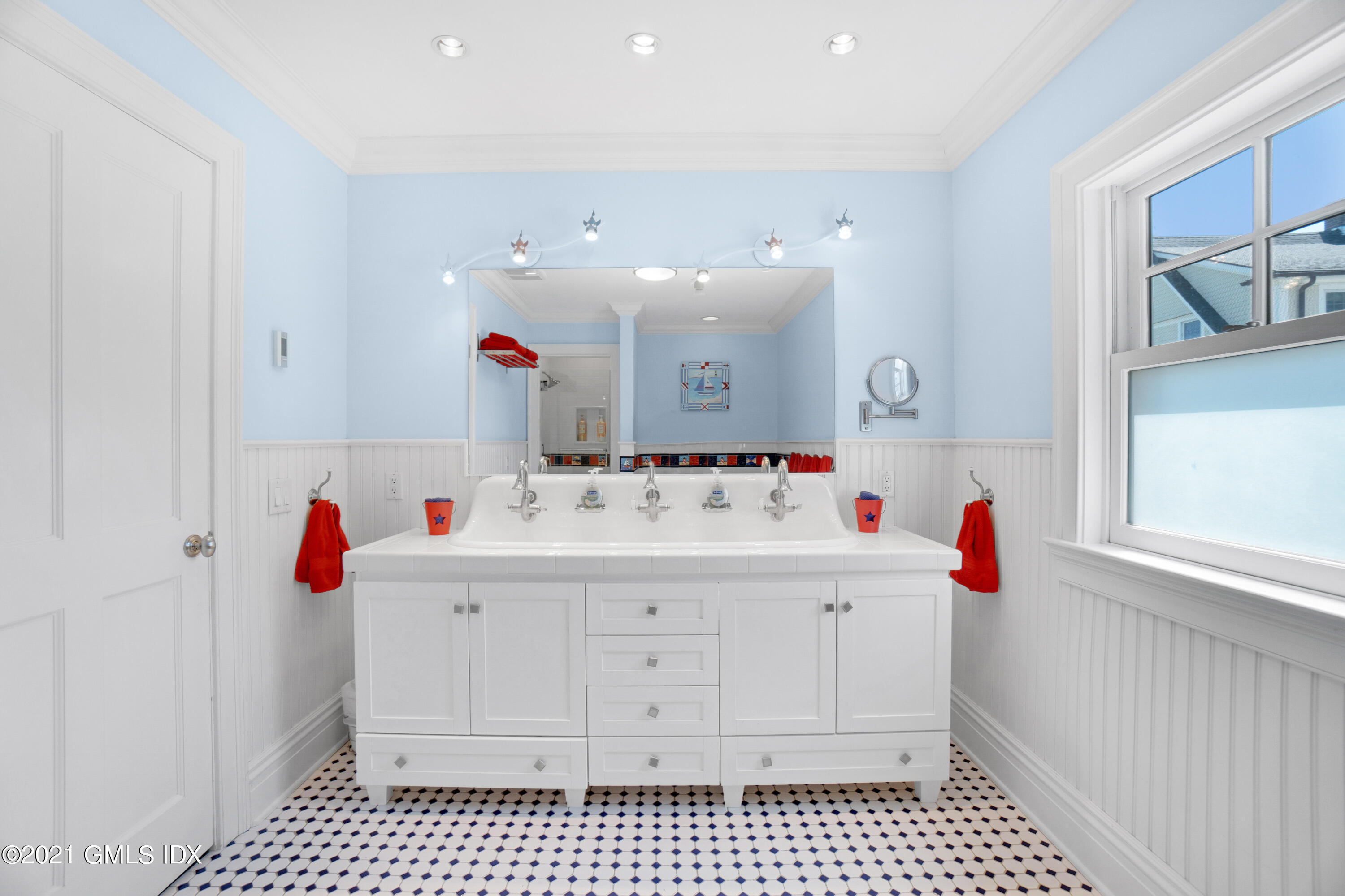 20 Ballwood Road Old Greenwich, CT 06870 - Photo 19 of 32 a bathroom with a sink vanity and mirror