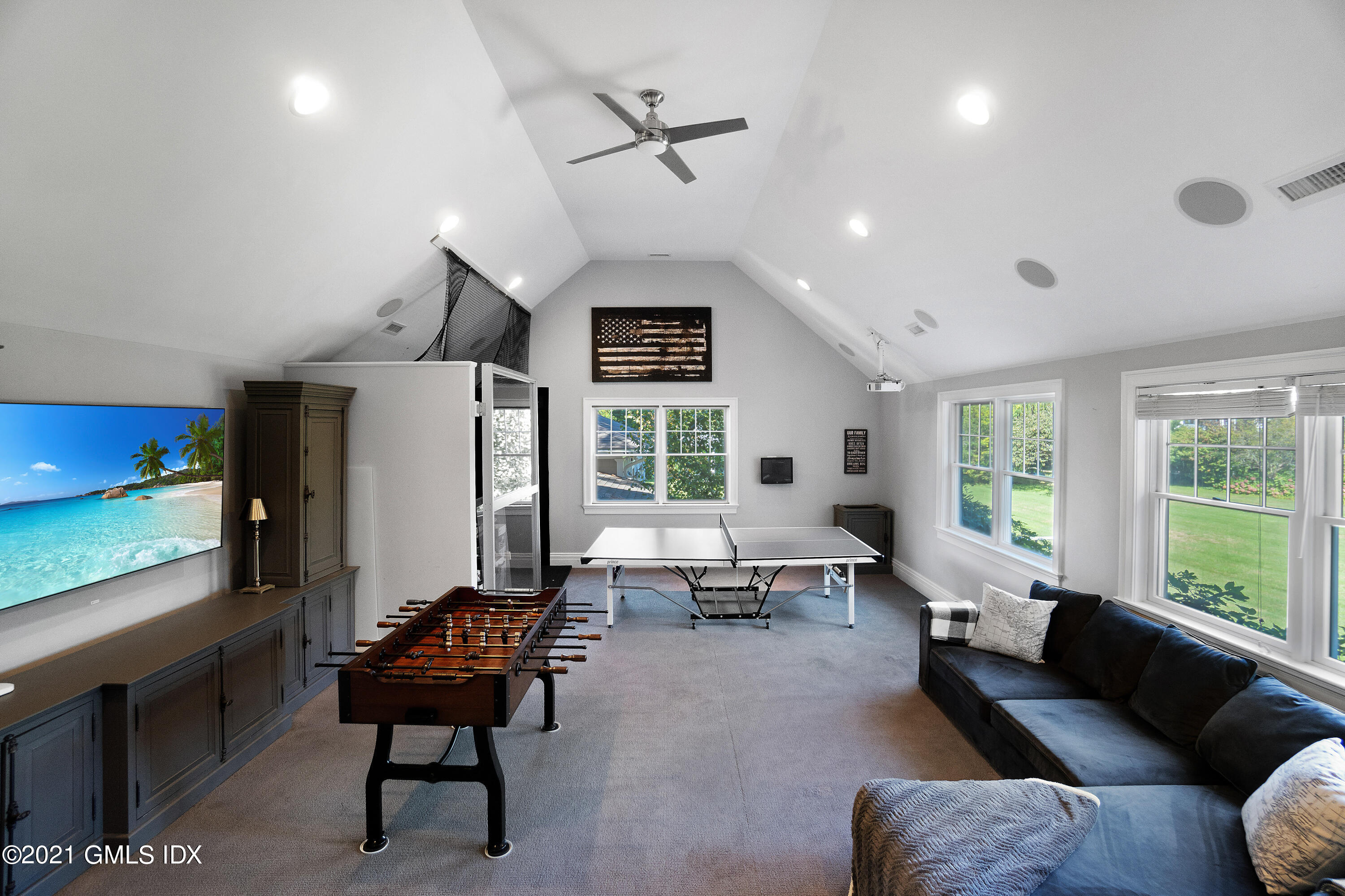 20 Ballwood Road Old Greenwich, CT 06870 - Photo 23 of 32 a living room with furniture and a flat screen tv