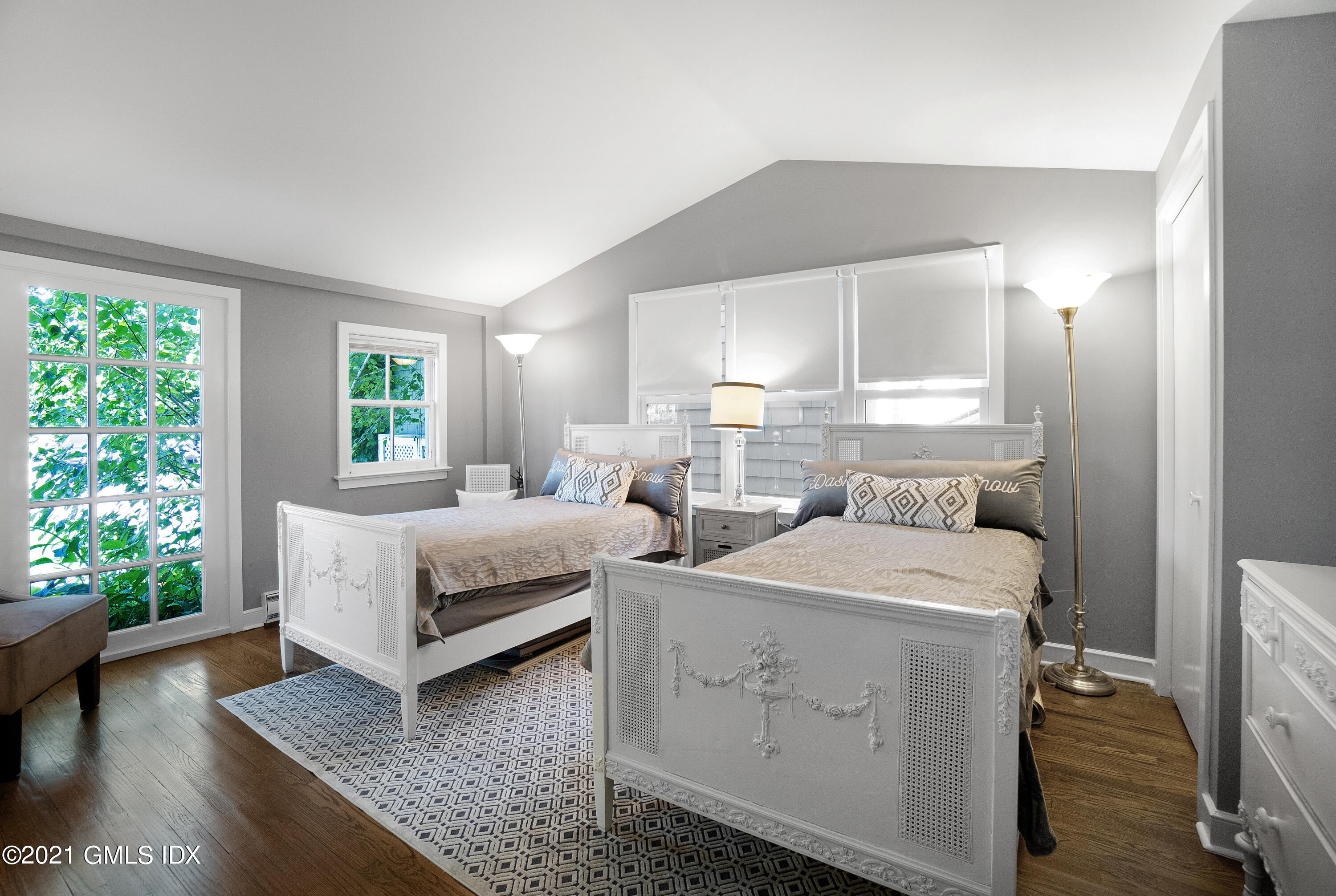 20 Ballwood Road Old Greenwich, CT 06870 - Photo 29 of 32 a bedroom with a bed and a window