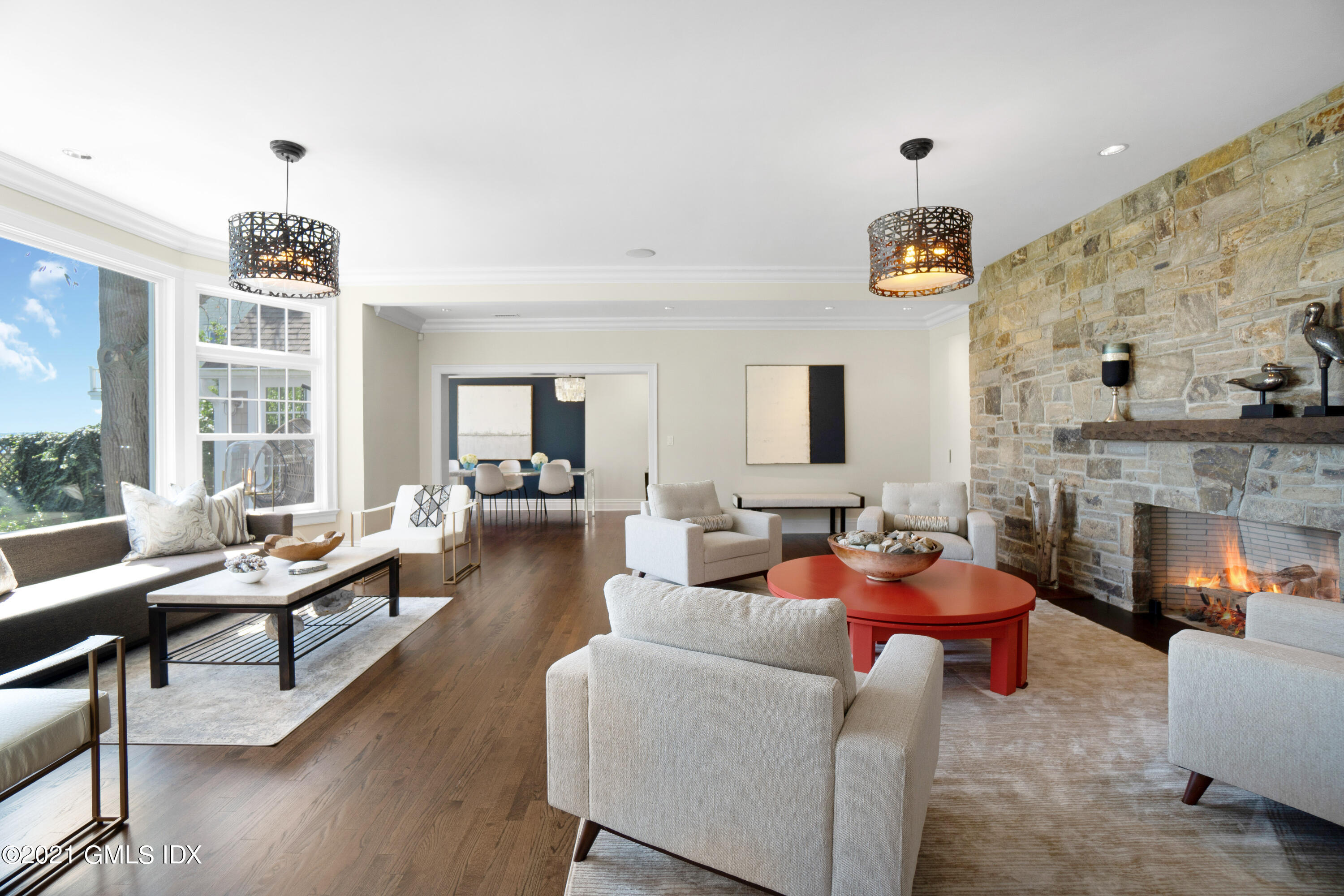 20 Ballwood Road Old Greenwich, CT 06870 - Photo 4 of 32 a living room with fireplace furniture and a large window