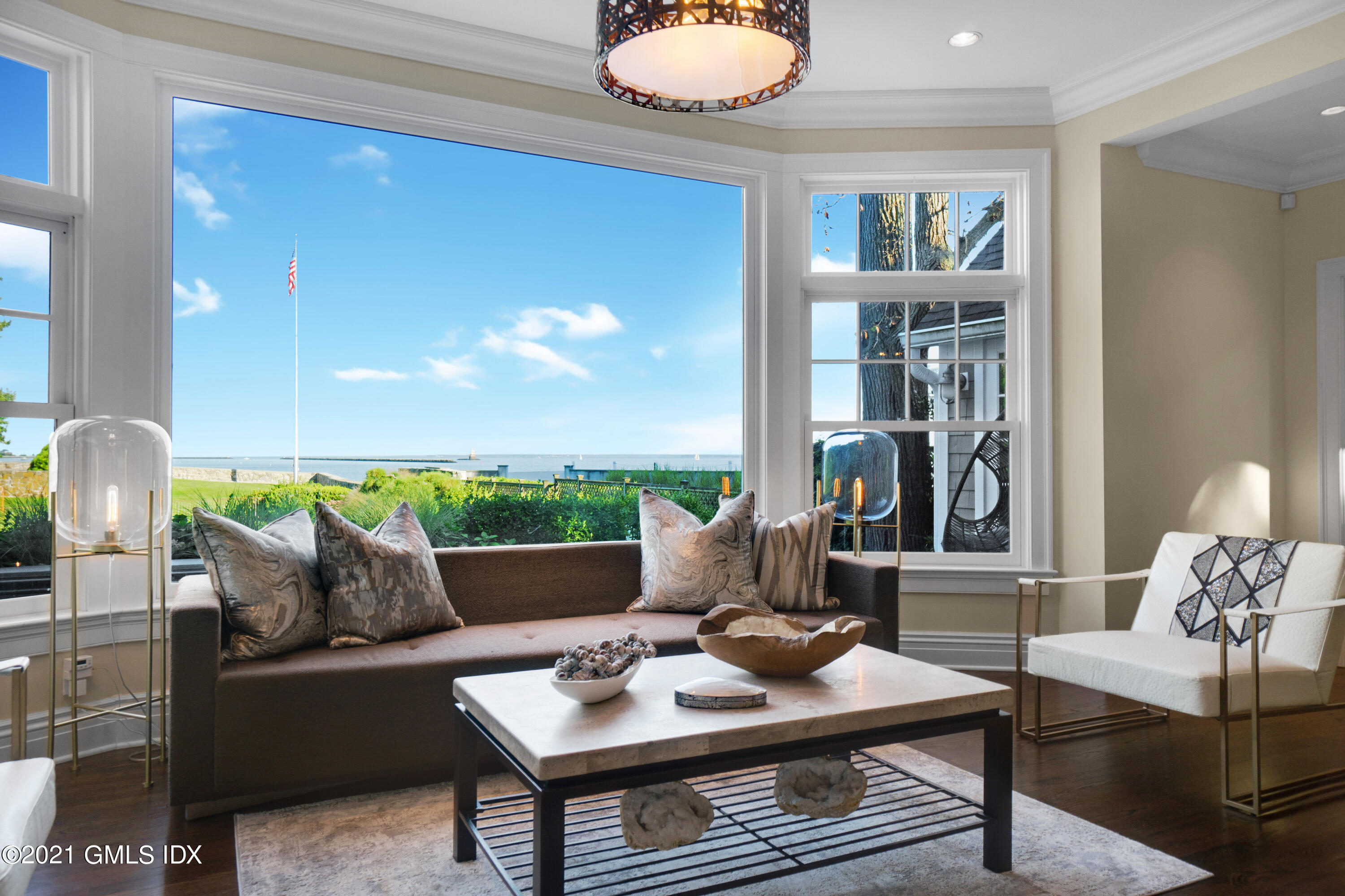 20 Ballwood Road Old Greenwich, CT 06870 - Photo 5 of 32 a living room with furniture and a lamp