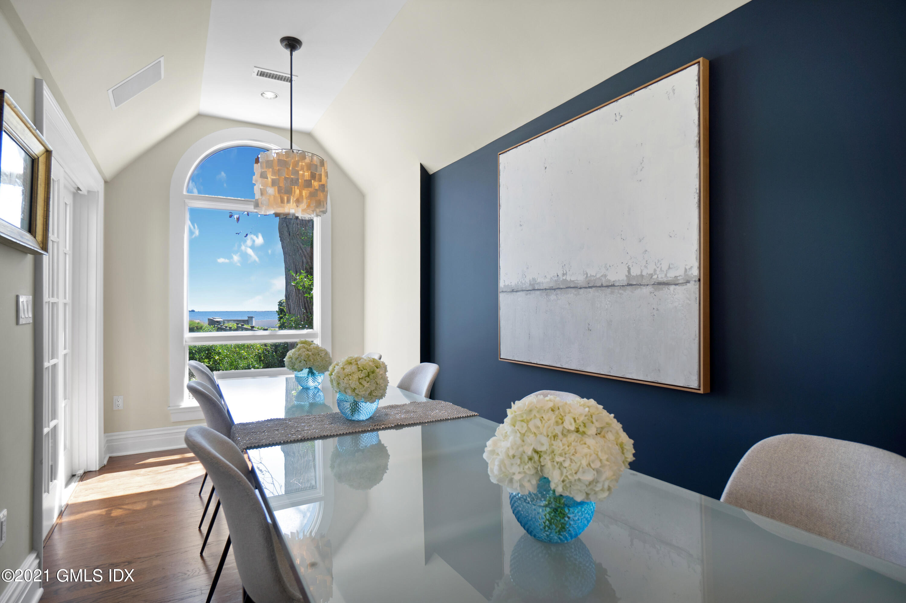 20 Ballwood Road Old Greenwich, CT 06870 - Photo 6 of 32 a living room with furniture and a chandelier