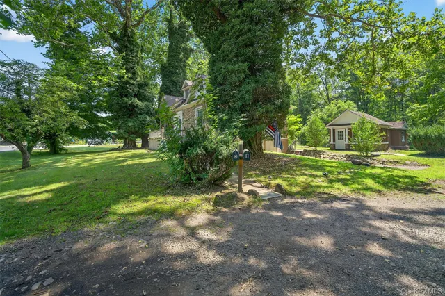 a view of a backyard with green space