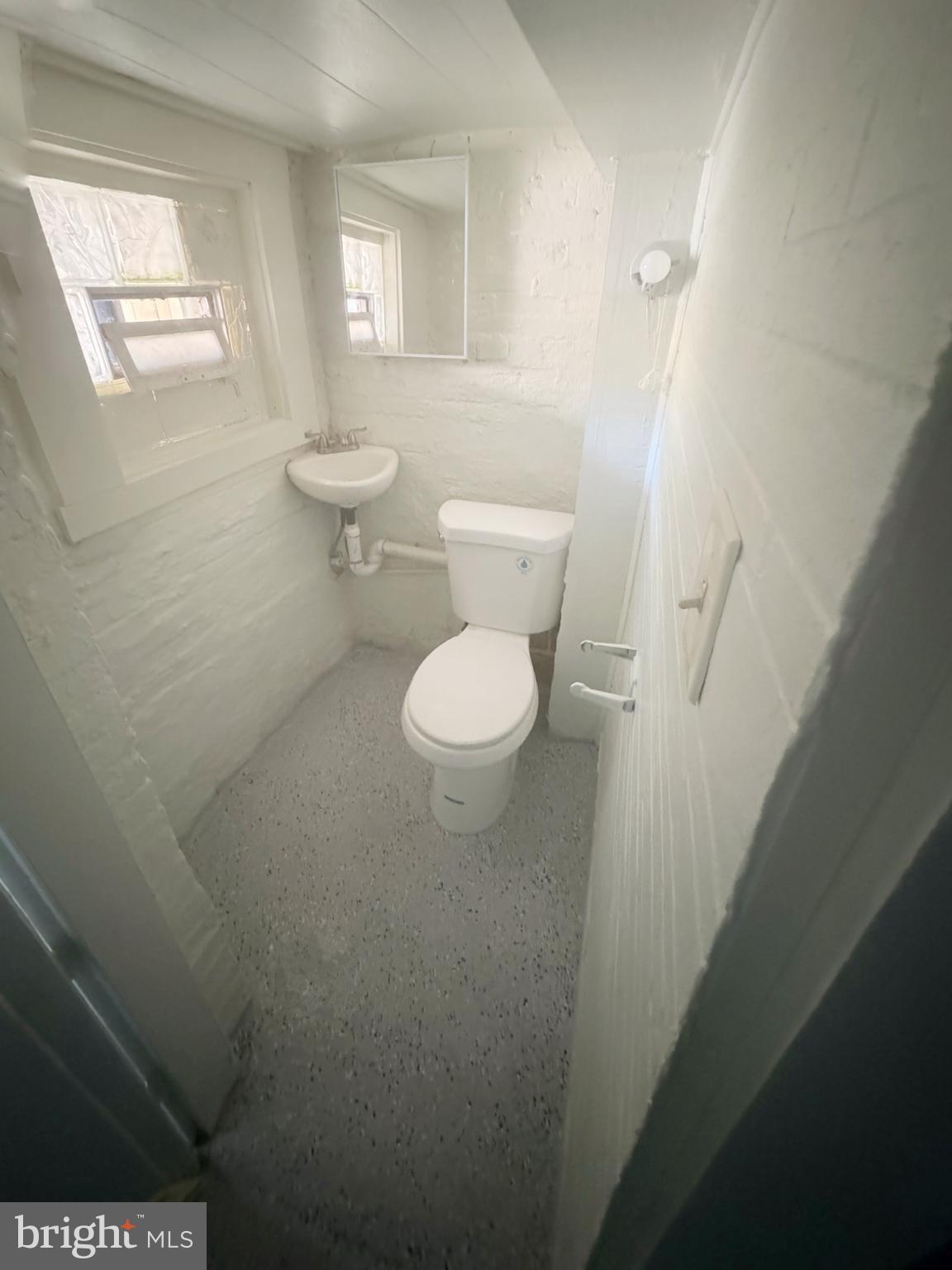 215 South Calhoun Street Baltimore, MD 21223 - Photo 11 of 15 a bathroom with a toilet