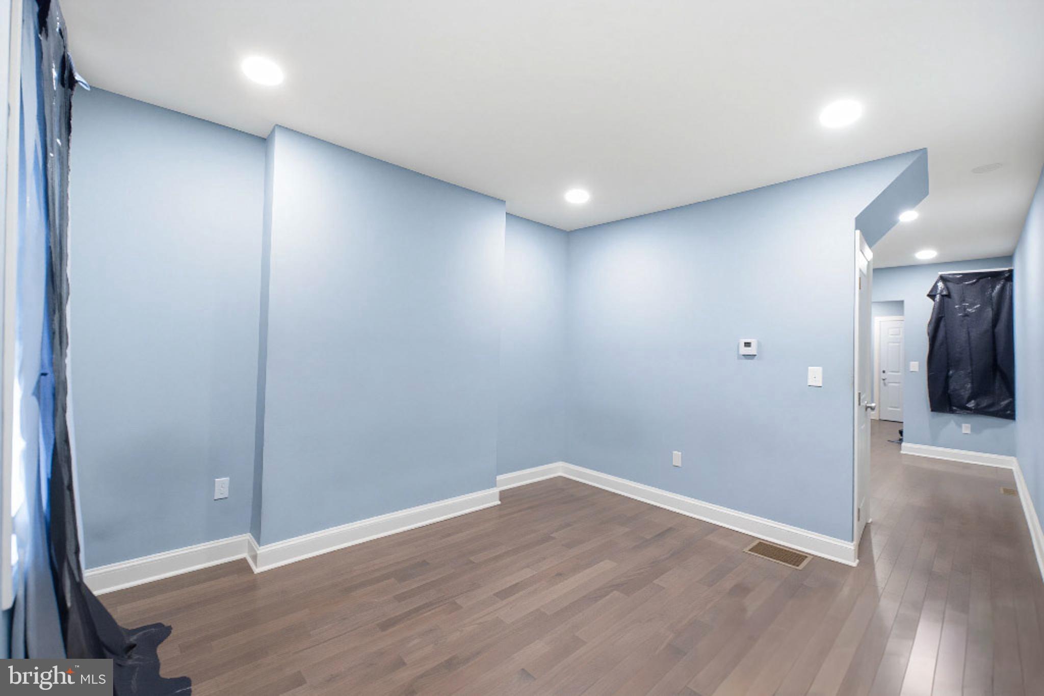 215 South Calhoun Street Baltimore, MD 21223 - Photo 3 of 15 a view of an empty room