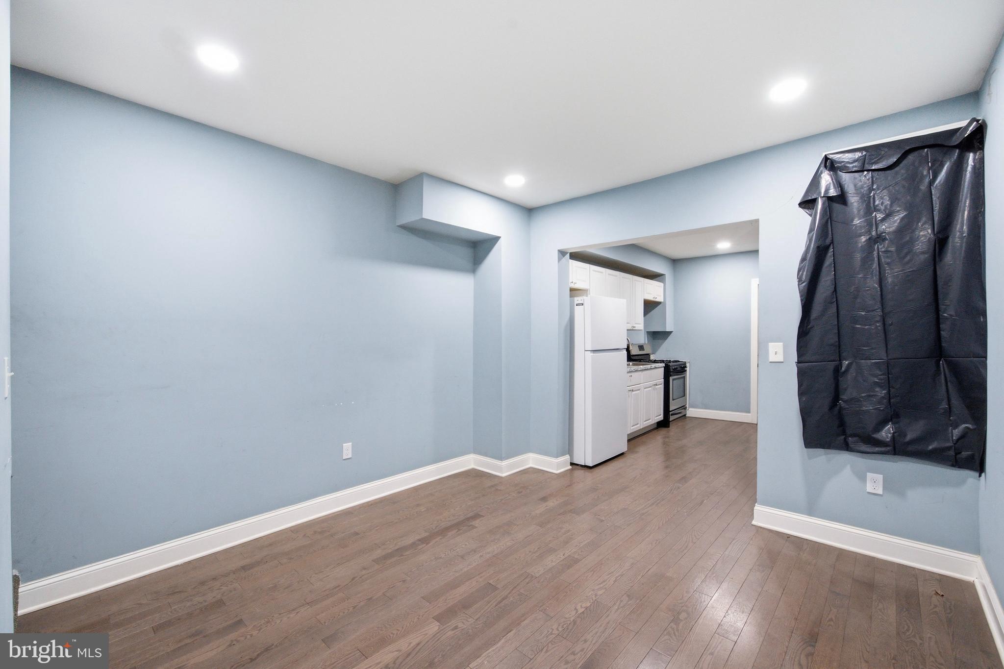 215 South Calhoun Street Baltimore, MD 21223 - Photo 4 of 15 a view of a walk in closet